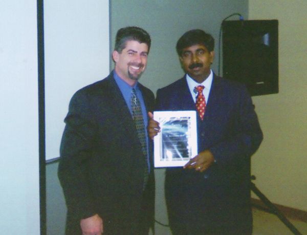 Receiving the Outstanding Contribution to Criminal Justice Education Plaque from Michael Pittaro, Lehigh Valley College, Pennsylvania, USA, February 2007